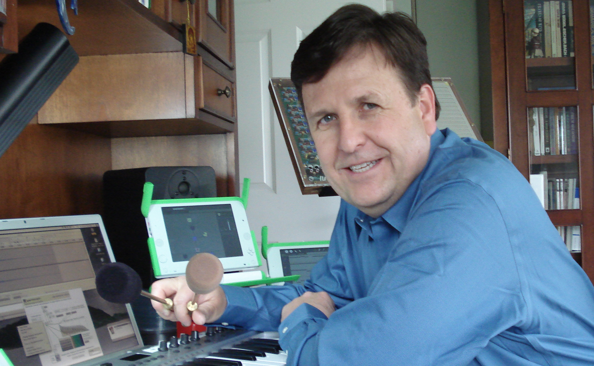 Boulanger with OLPC and Radio Baton at desk